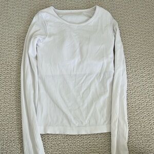 Lululemon Ebb to Street waist length tee size 4 white